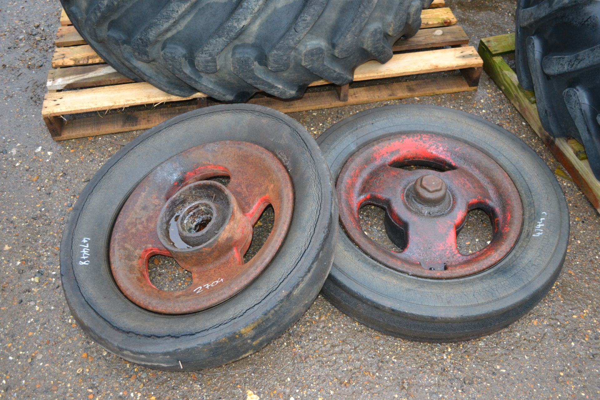 Pair of Fordson Major cast front wheels and tyres.