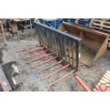 Slewtic muck fork. CAT telehandler brackets. V