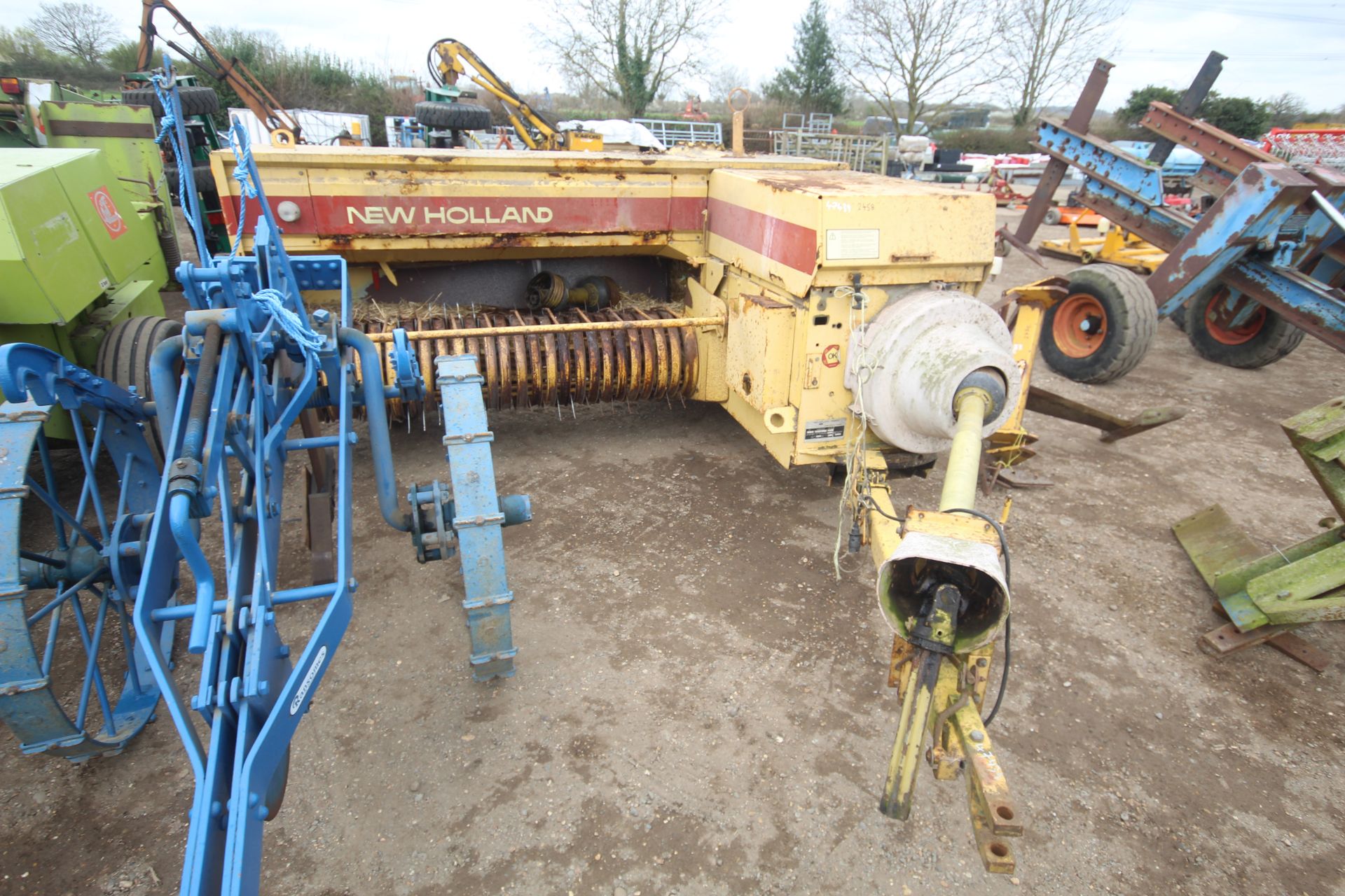 New Holland 945 conventional baler. V