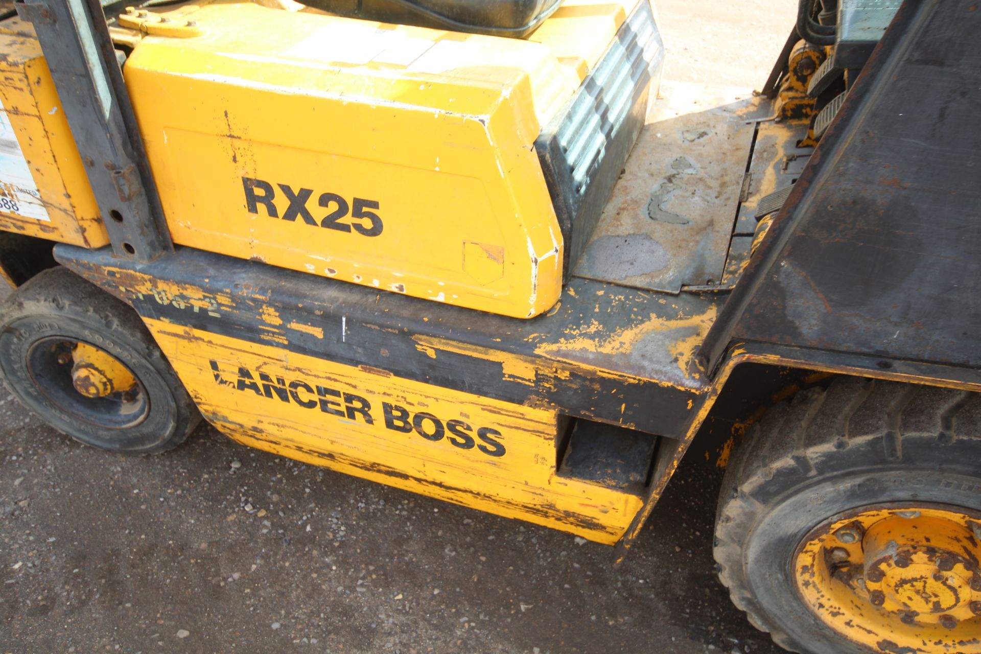 Lancer Boss RX25L 2.5T gas yard forklift. 7,027 hours. With Nissan engine and triplex mast. Key - Image 17 of 53