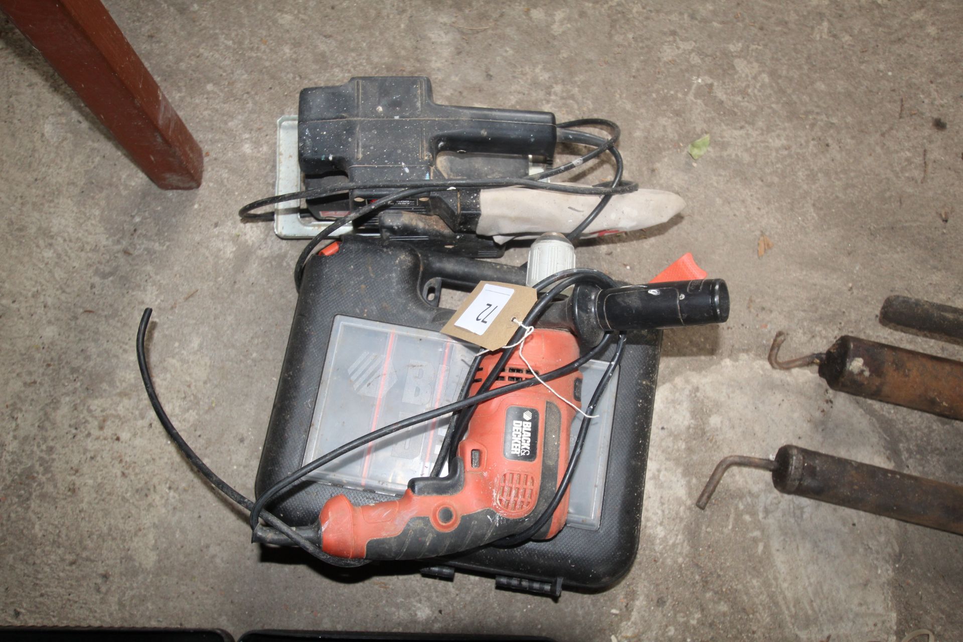 Black & Decker drill with case and a Skil belt sander.