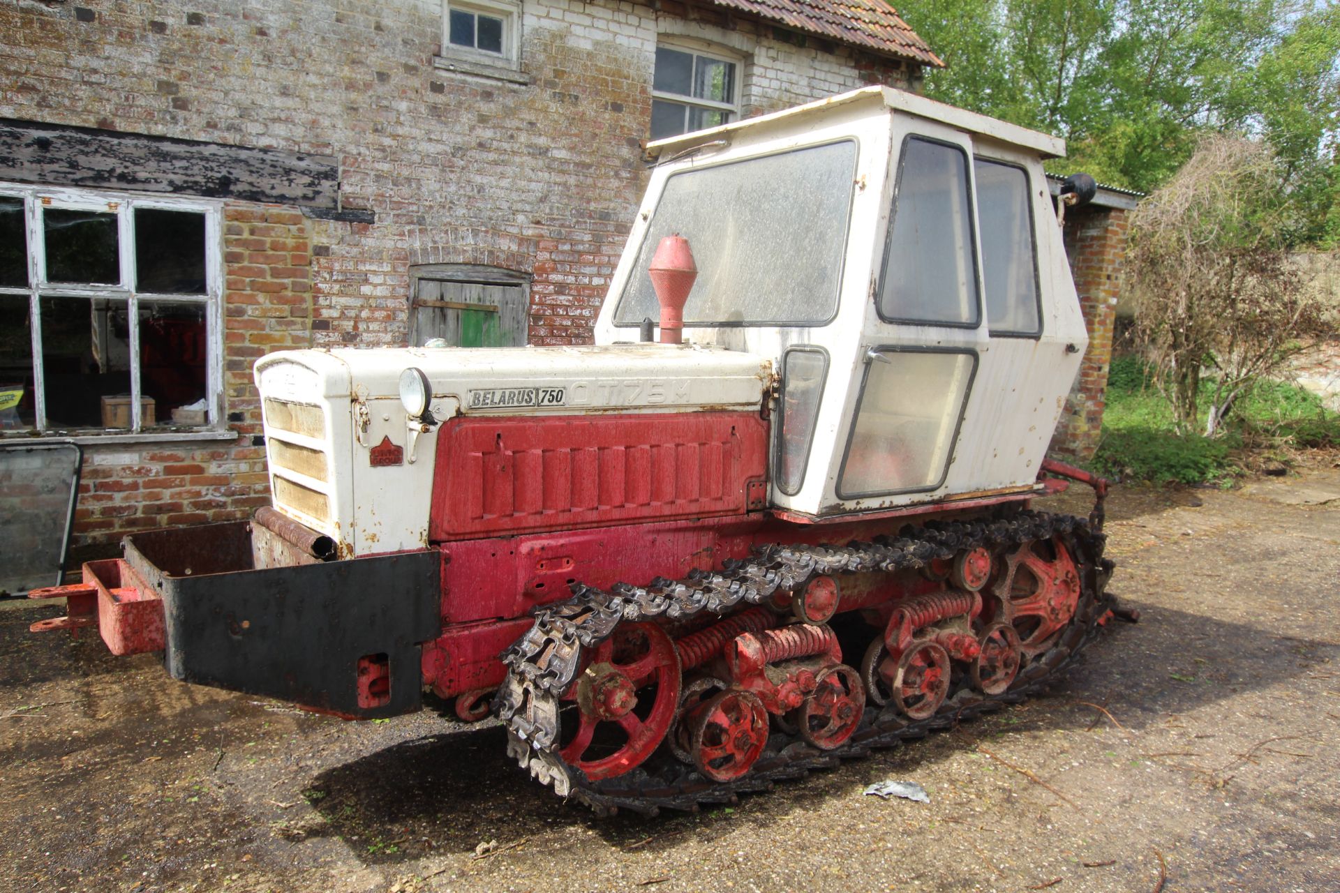 Belarus 750 four-cylinder diesel engine steel track crawler. Registration GMU 427N. Date of first