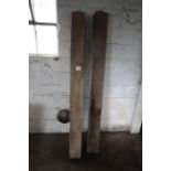 Pair unused 7in x 7in x 7ft wooden gate posts.