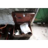 Tin trunk with various drainage pipe fittings etc.