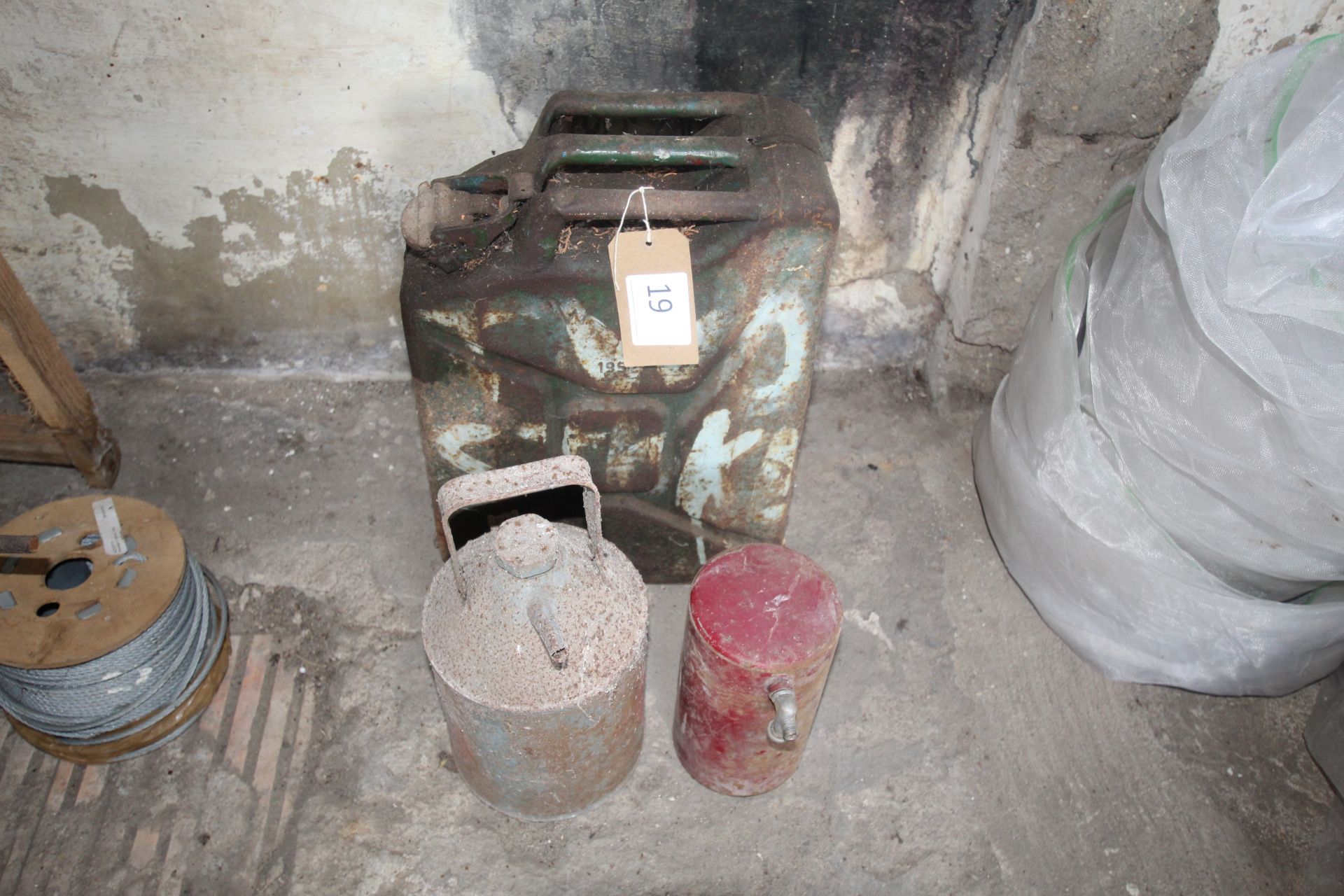 1952 War Department Jerry can, Aladdin paraffin can and a stationary engine fuel tank.