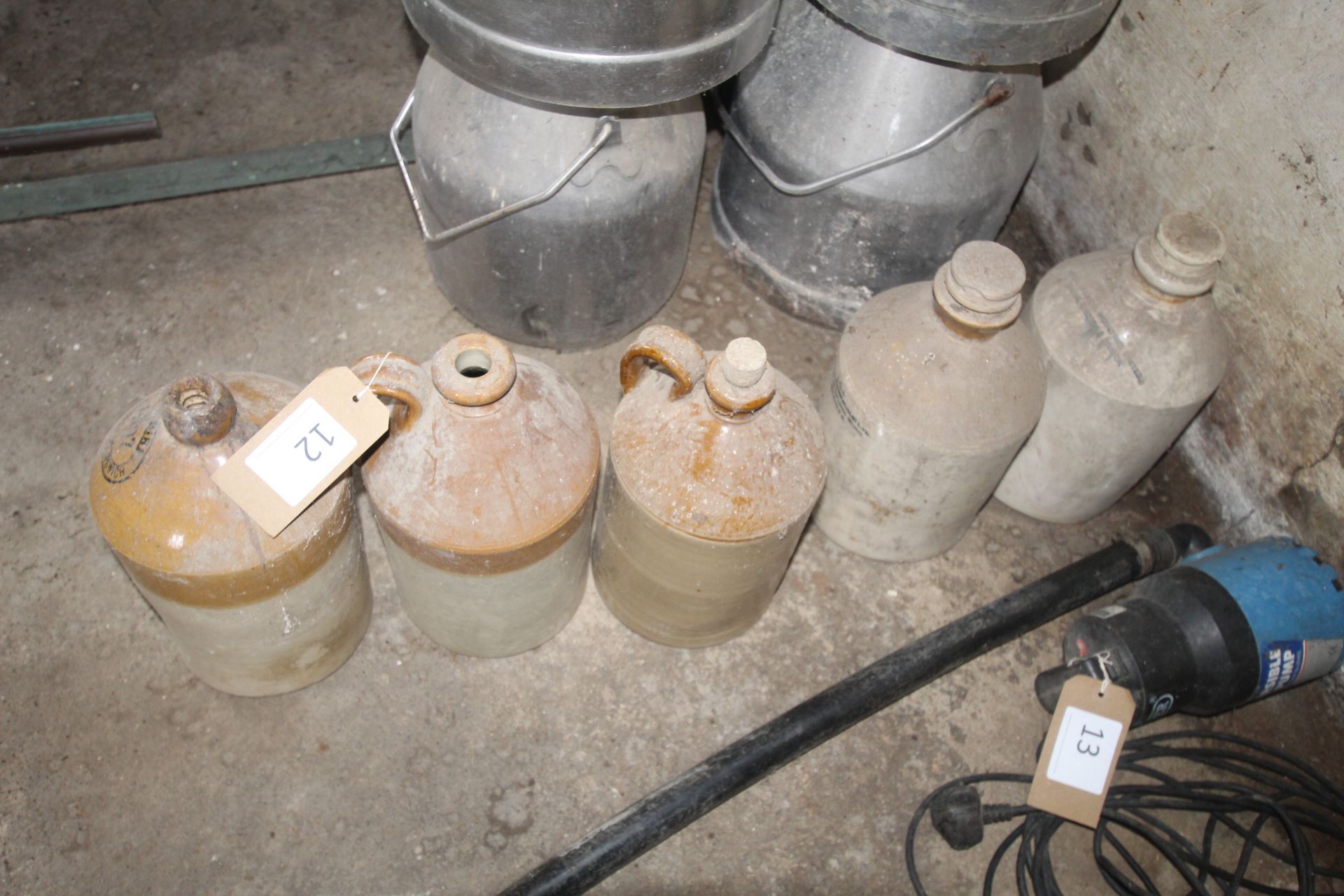 5x stoneware bottles.