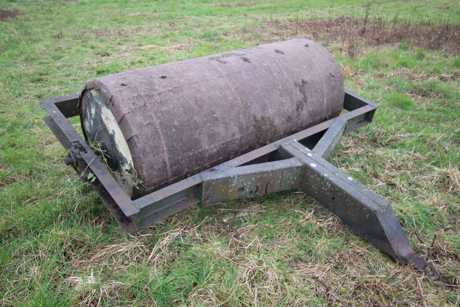 Farm made large concrete filled flat roll.