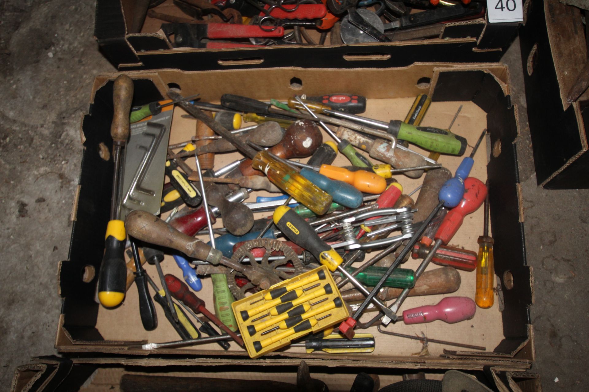 Tray of various screwdrivers.