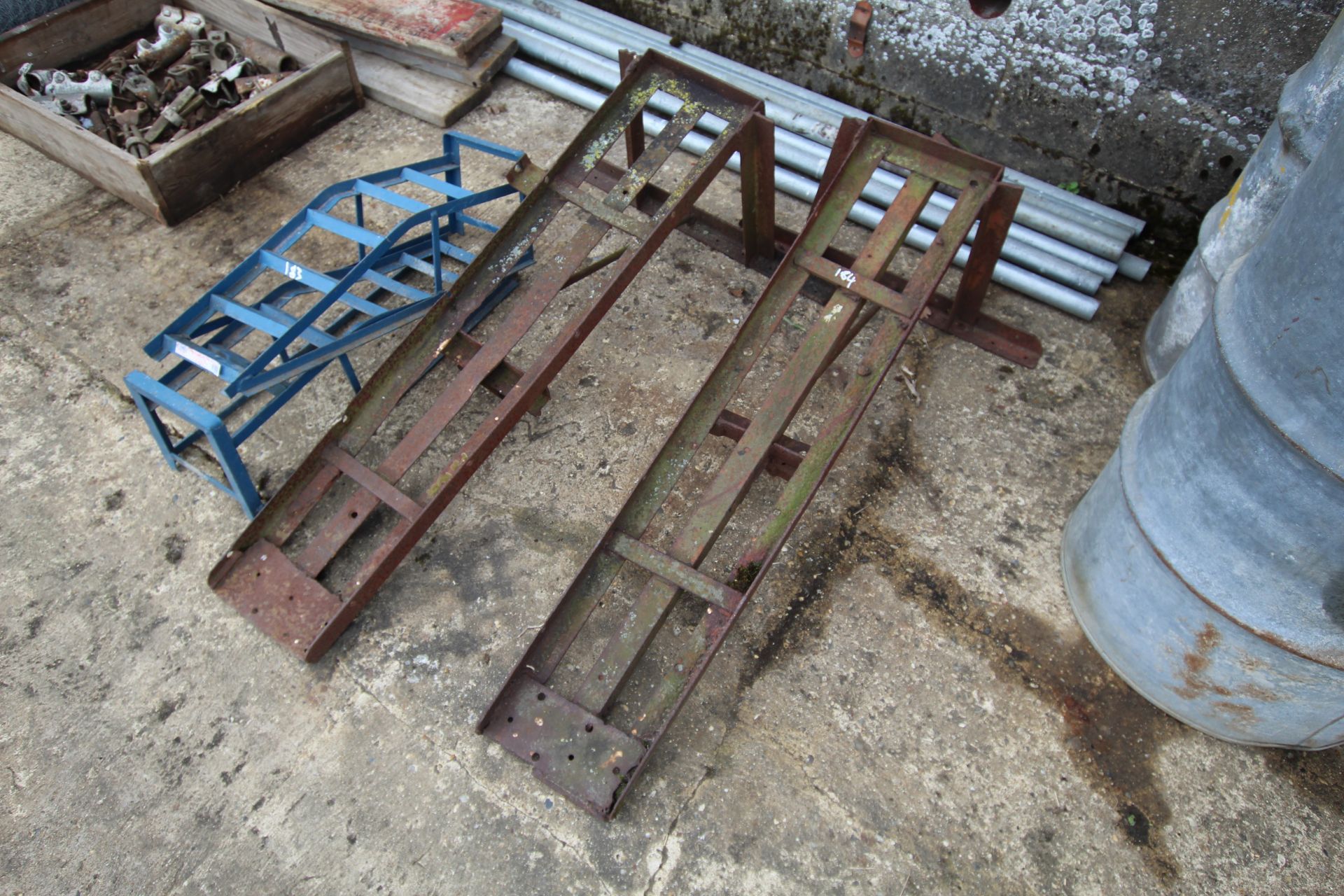 Pair of large farm made vehicle ramps.