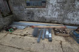 Various scaffolding, scaffold clamps and boards.