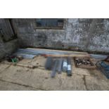 Various scaffolding, scaffold clamps and boards.