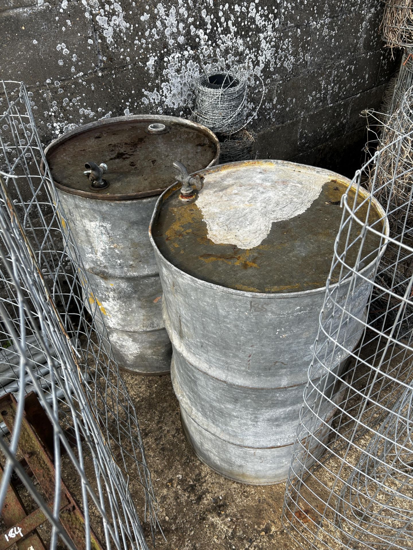 Pair of galvanised 40gallon drums with taps.