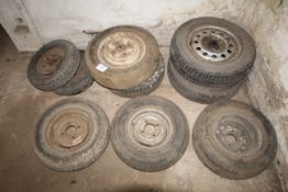 Various car and other wheels and tyres.