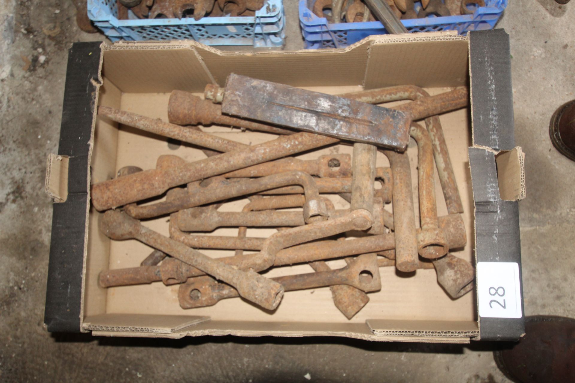 Box of various wheel spanners.