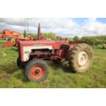 McCormick 434 2WD tractor. Registration FDX4 58D (expired). Serial No. B/2894. With Quicke loader (
