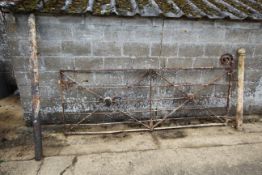Approx. 10ft ornate metal gate with slam post and