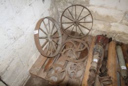 Various cast iron wheels.