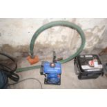 Draper Expert petrol driven water pump with suction hose.