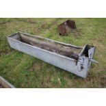 Galvanised water trough.