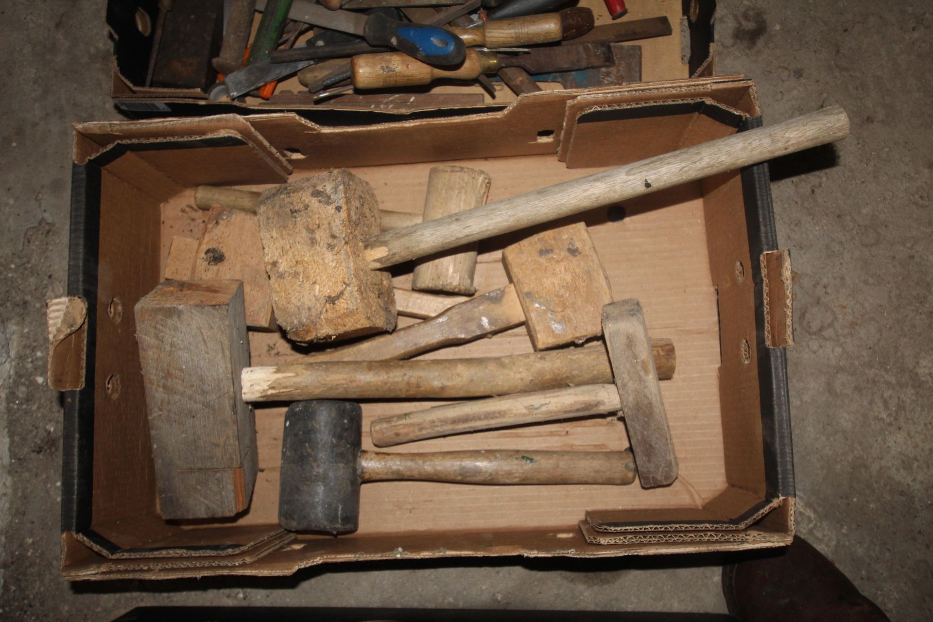 Tray of various wooden and rubber mallets.