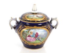 A 19th Century Sevres porcelain sucrier and cover, decorated romantic and rural panels, heightened