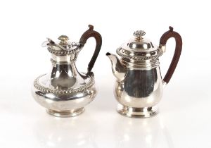 A plated coffee pot, with gadrooned border decoration; and a similar plated hot water jug