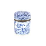 A Limoges porcelain blue and white needle case with hinged lid, profusely decorated flowers, 9.3cm