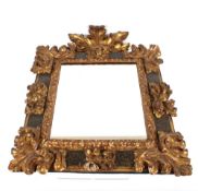 A gilt and painted Florentine wall mirror, decorated foliate scrolls and acanthus, probably 18th