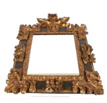 A gilt and painted Florentine wall mirror, decorated foliate scrolls and acanthus, probably 18th