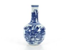A late 18th / early 19th Century Chinese porcelain blue and white bottle vase, decorated with