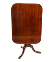A George III mahogany snap top occasional table, the rectangular top raised on turned baluster