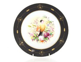 A late 19th Century continental porcelain cabinet plate, with central decoration of birds seated