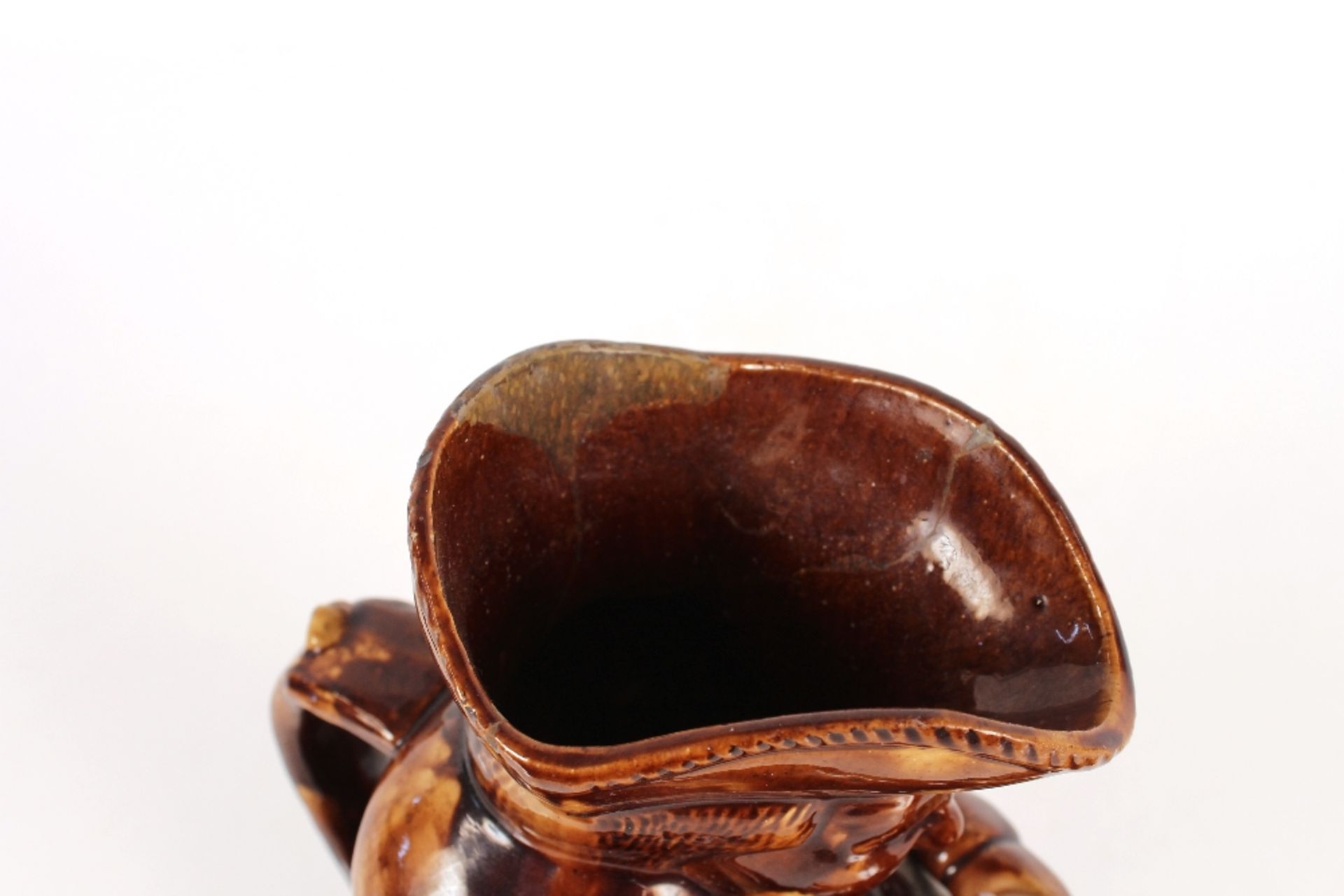 A 19th Century treacle glazed Uncle Toby tea pot, 25cm high - Image 3 of 5