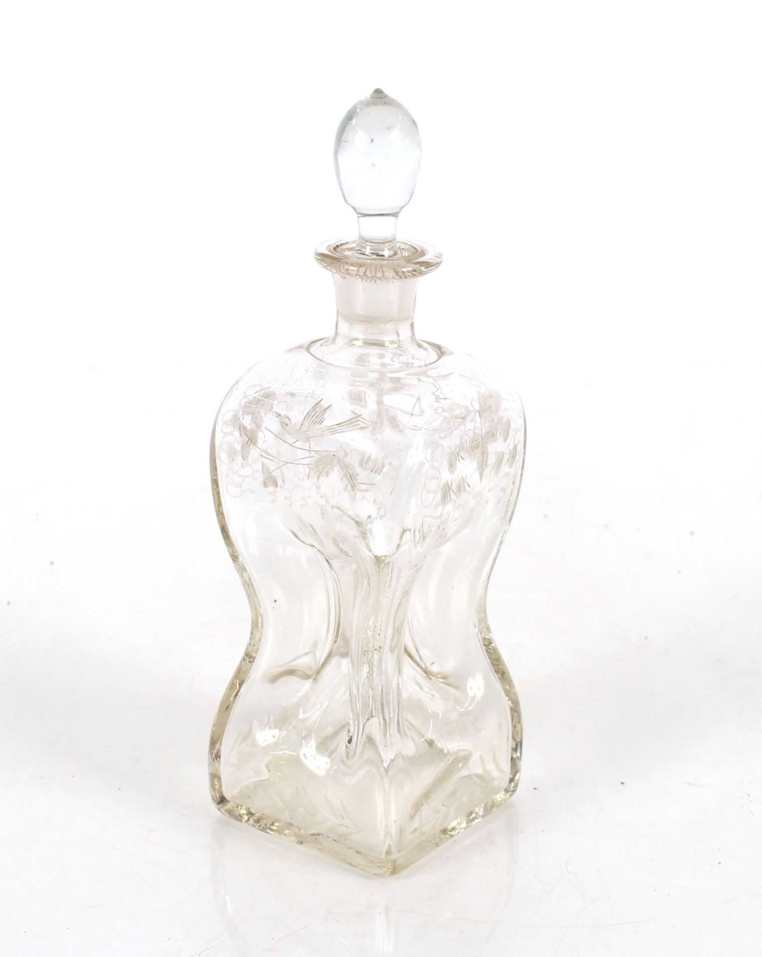 A 19th Century hour glass shaped decanter, having bird and floral etched decoration, 24cm high