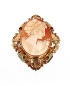 A 9ct gold mounted cameo brooch, 23gms total weight; and a yellow metal brooch set three coloured