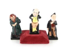 Three Royal Doulton figures, "Mr Pickwick", "Fagin" and "Mr Pecksniff"