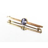 A 9ct gold and sapphire bar brooch