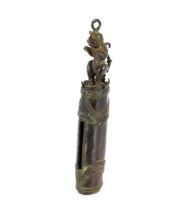 An unusual antique South East Asian bronze hanging temple gong with lion terminal, 30cm