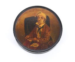 A 19th Century circular papier mâché snuff box entitled "The Black Draught", 10cm dia.; and a papier