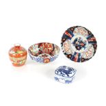 An Imari scallop bordered plate; an Imari bowl; a Chinese covered bowl decorated horses and foliage,