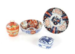An Imari scallop bordered plate; an Imari bowl; a Chinese covered bowl decorated horses and foliage,