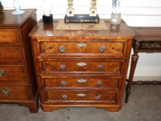A 19th Century Continental walnut chest fitted four long graduated drawers with brass foliate