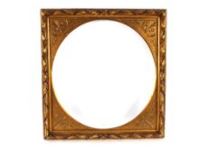 A carved gilt wood picture frame of large proportions, with oval insert, 77cm x 73cm overall