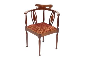A pair of Edwardian mahogany and chequer banded corner chairs, raised on rounded supports and pad