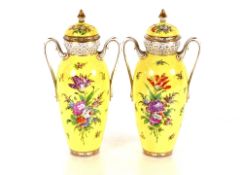 A pair of 19th Century Dresden porcelain vases and