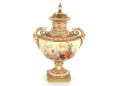 An Edwardian Royal Worcester baluster vase and cover, richly decorated with foliate sprays