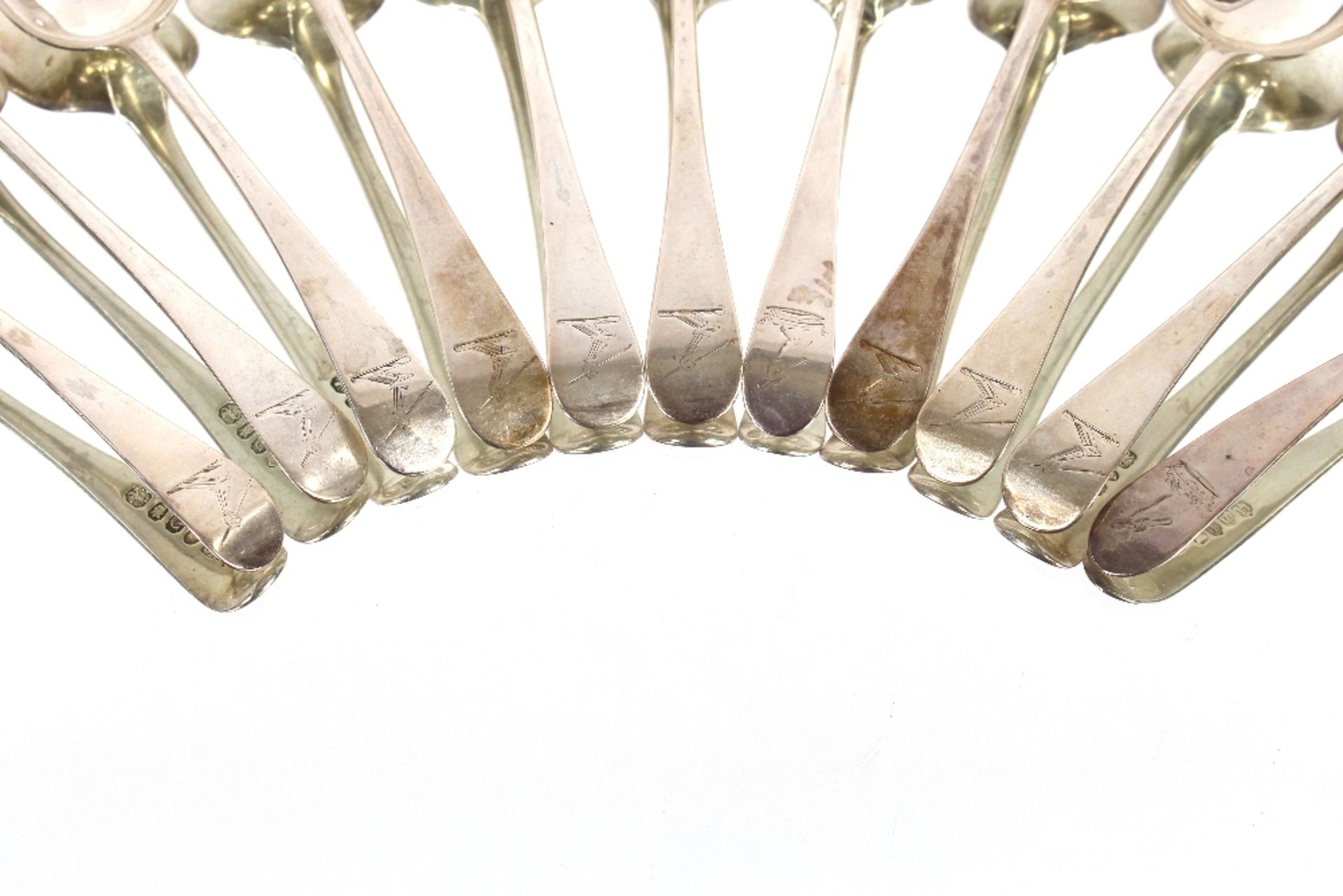 Nine George III silver "Old English" pattern dessert spoons, bearing family crests, London 1802; and - Image 2 of 8