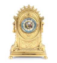 A 19th Century French Ormolu mantel clock, having foliate and rams head decoration, the circular