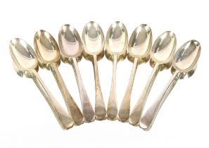A set of eight Edwardian silver "Fiddle" pattern table spoons, London 1908, 19oz