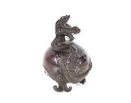 A 19th Century Oriental bronze censer of spherical form, having coiled dragon decoration to the